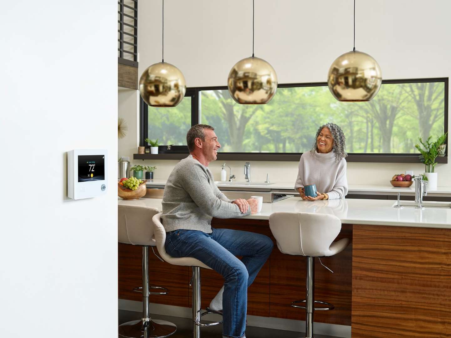 Sandium HVAC technician servicing AC unit in a Cupertino, CA home