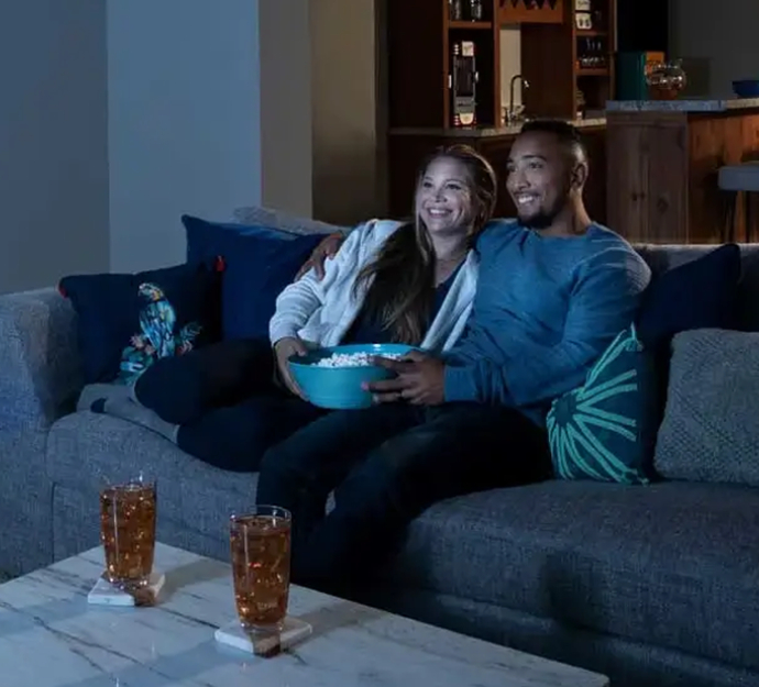 Sandium technician installing new air duct system in San Jose home with precision sealing