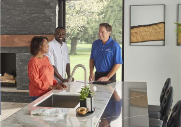 Technician analyzing HVAC system efficiency as part of Sandium’s energy audit services